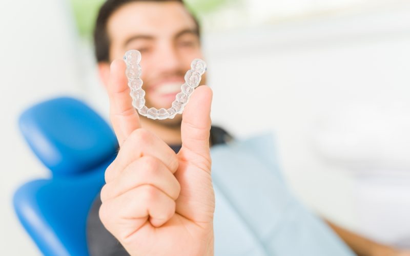 Close,Up,Of,A,Happy,Man,And,Dentist,Patient,Smiling Close,Up,Of,A,Happy,Man,And,Dentist,Patient,Smiling